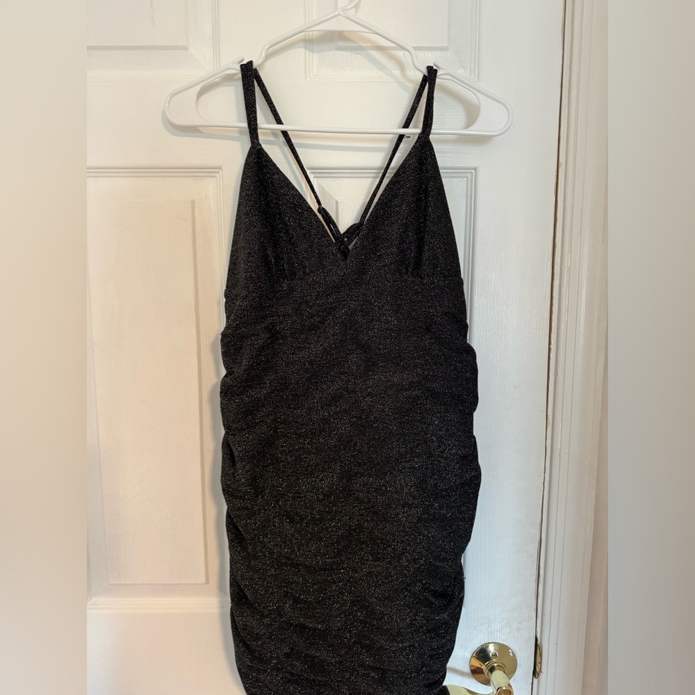Black glittery dress.